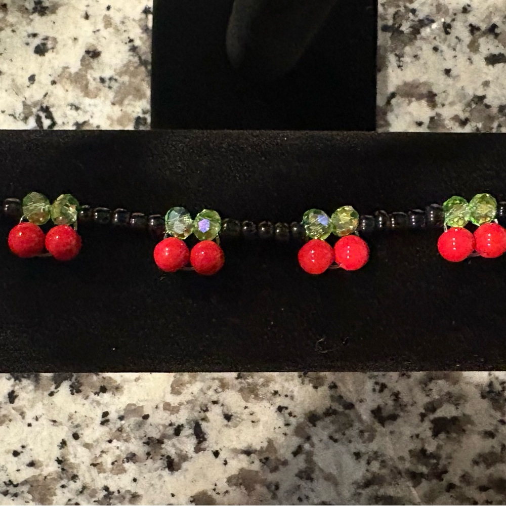 Elegant Red and Green Beaded Bracelet